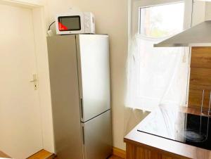Cucina o angolo cottura di Fully Equipped Spacious Worker Apartment