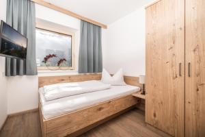 Postel nebo postele na pokoji v ubytování Zeit.Glück Appartements