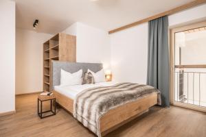 Postel nebo postele na pokoji v ubytování Zeit.Glück Appartements