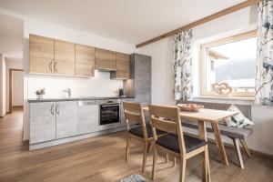 Kuchyň nebo kuchyňský kout v ubytování Zeit.Glück Appartements