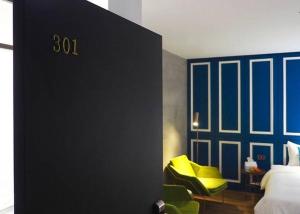 Postel nebo postele na pokoji v ubytování 小小邸 Small Hotel