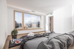 Postel nebo postele na pokoji v ubytování Zeit.Glück Appartements