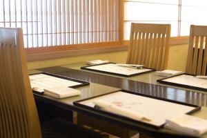 Postel nebo postele na pokoji v ubytování Miyako Hotel Yokkaichi