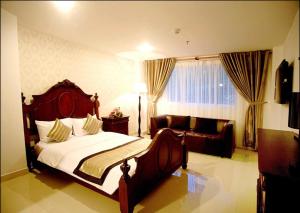 Giường trong phòng chung tại New Sunny Hotel