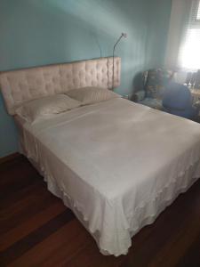 Katil atau katil-katil dalam bilik di Quartos em Laranjeiras