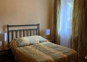 Ένα ή περισσότερα κρεβάτια σε δωμάτιο στο Dom Potok