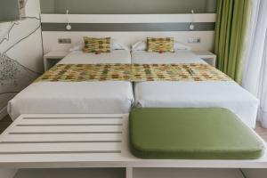 Cama o camas de una habitación en Hotel Aloe Canteras