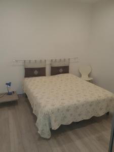 Postel nebo postele na pokoji v ubytování Domaine le licou