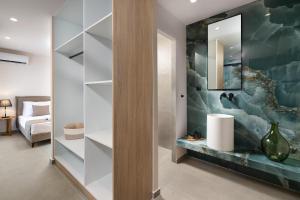 A bed or beds in a room at Mirena Luxury Living-Casa di Maria
