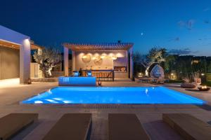 The swimming pool at or close to Mirena Luxury Living-Casa di Maria