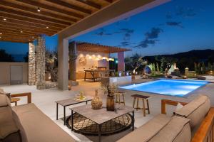 The swimming pool at or close to Mirena Luxury Living-Casa di Maria
