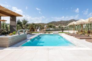The swimming pool at or close to Mirena Luxury Living-Casa di Maria