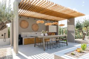 A patio or other outdoor area at Mirena Luxury Living-Casa di Maria