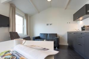 Posezení v ubytování Hello Zeeland - Vakantiehuis Beatrixstraat 29A