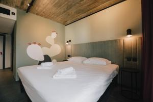 Postel nebo postele na pokoji v ubytování ibis Styles ST Pauls Bay Malta