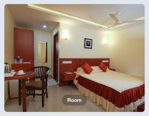 Katil atau katil-katil dalam bilik di Hotel Sasthapuri