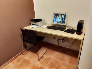 TV a/nebo společenská místnost v ubytování Domus San Bernardino