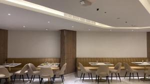 אזור ישיבה ב-Corp Executive Hotel Doha Suites