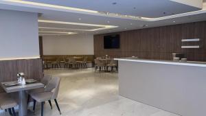 טלויזיה ו/או מרכז בידור ב-Corp Executive Hotel Doha Suites