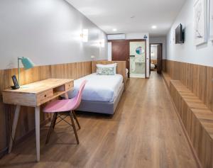 Postel nebo postele na pokoji v ubytování Hotel Rural Solar das Arcadas + 37 fotografií