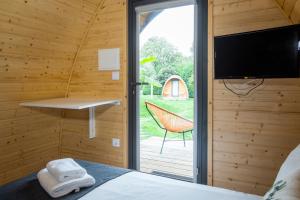 TV a/nebo společenská místnost v ubytování Hotel Rural Solar das Arcadas