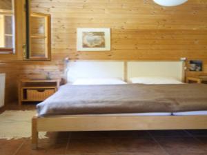 Ein Bett oder Betten in einem Zimmer der Unterkunft Ferienhaus - Weißer Steg Sieben