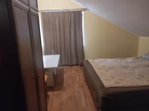 Postel nebo postele na pokoji v ubytování Krone Hostel