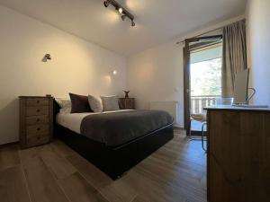 Posteľ alebo postele v izbe v ubytovaní LES FREINETS - Apt D02 - BO Immobilier - Châtel - Multipass été 2025 offert
