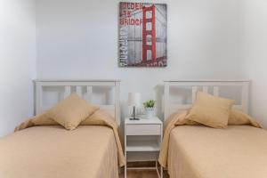 Posteľ alebo postele v izbe v ubytovaní Home2Book Charming Attic Arucas Center, Terrace