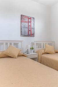 Posteľ alebo postele v izbe v ubytovaní Home2Book Charming Attic Arucas Center, Terrace