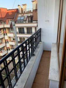 a balcony with a view of a building at Like Home Guest Rooms in Sofia