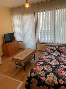 Кът за сядане в Like Home Guest Rooms