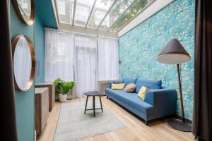 Zona de estar de Musea Hotel & Apartments
