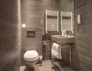 Un baño de Musea Hotel & Apartments