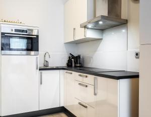 Una cocina o zona de cocina en Musea Hotel & Apartments