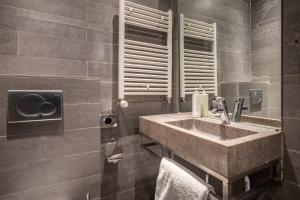 Un baño de Musea Hotel & Apartments