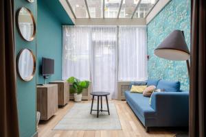 Zona de estar de Musea Hotel & Apartments
