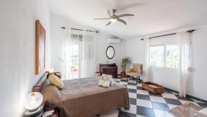 Łóżko lub łóżka w pokoju w obiekcie Villa el Cerrillo Málaga - Churriana by Ruralidays