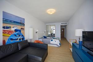 TV a/nebo společenská místnost v ubytování Ocean View Apartment