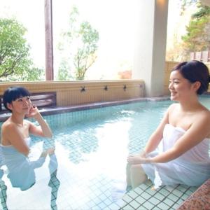 two women sitting in a swimming pool at Kyukamura Ohmi-Hachiman in Omihachiman +38 photos