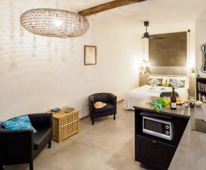 Kuchyň nebo kuchyňský kout v ubytování Camaella Luxury Studio