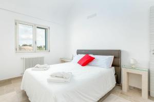 Posteľ alebo postele v izbe v ubytovaní Villa Trullina by Raro Villas