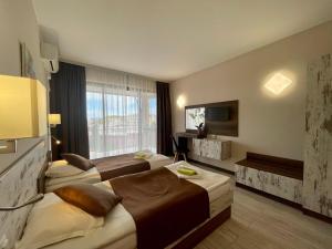 Ένα ή περισσότερα κρεβάτια σε δωμάτιο στο Villa Amfora +73 φωτογραφίες