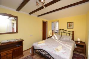 Postel nebo postele na pokoji v ubytování Apartment Stari Grad