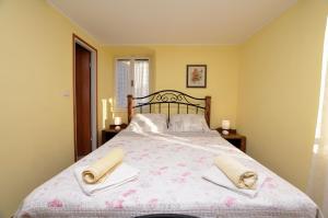 Postel nebo postele na pokoji v ubytování Apartment Stari Grad