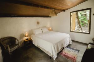 Cama ou camas em um quarto em Pousada Peixe do Mato mais 37 fotos