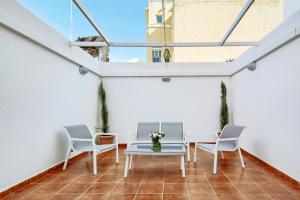 Posedenie v ubytovaní Amplio piso con terraza