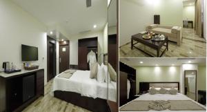 a hotel room with a bed and a living room at Regenta Inn Ranip Ahmedabad in Ahmedabad
