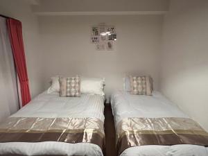 Кровать или кровати в номере Crest Daikoku Owner's room -vacation rental-