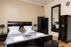 Łóżko lub łóżka w pokoju w obiekcie Gdynia Centrum Wyjątkowy Apartament przy Promenadzie z Balkonem by Noclegi Renters